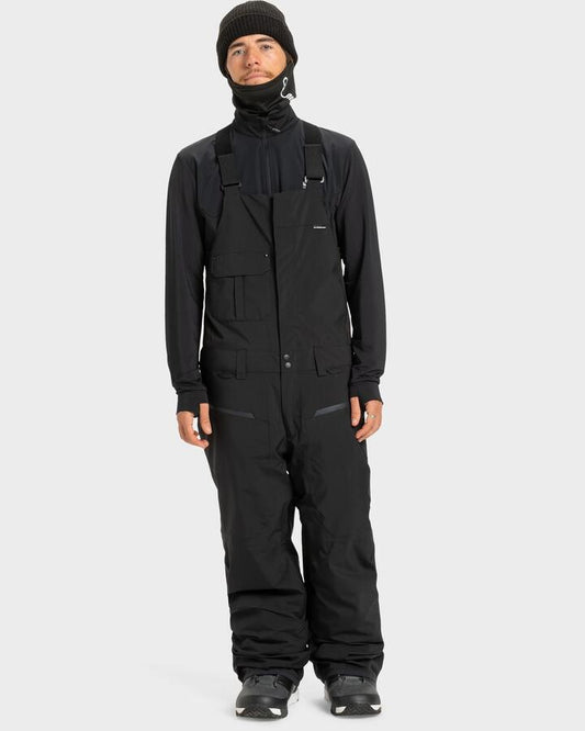 Image of a model wearing Pants. Productname: Quiksilver - Mens Paramo Stretch 20K Bib Snow Pants - True Black - in True Black colour by brand - Quiksilver