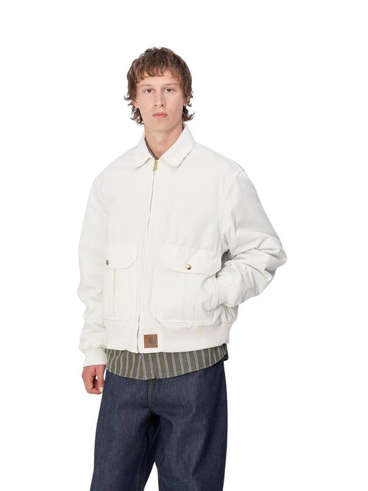 Image of a model wearing Outerwear. Productname: Carhartt Wip Stanton Jacket in Wax / Wax colour by brand - Carhartt Wip