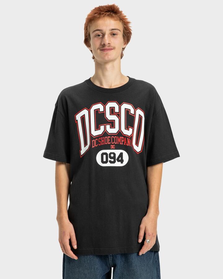 Image of a model wearing Tops. Productname: DC Shoes - Mens Elevtive T-Shirt - Black - in Black colour by brand - DC Shoes