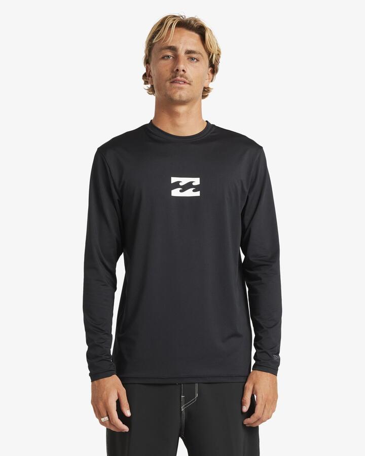 Image of a model wearing Tops. Productname: Billabong - Mens All Day Wave Long Sleeve Rash Vest - Black - in Black colour by brand - Billabong