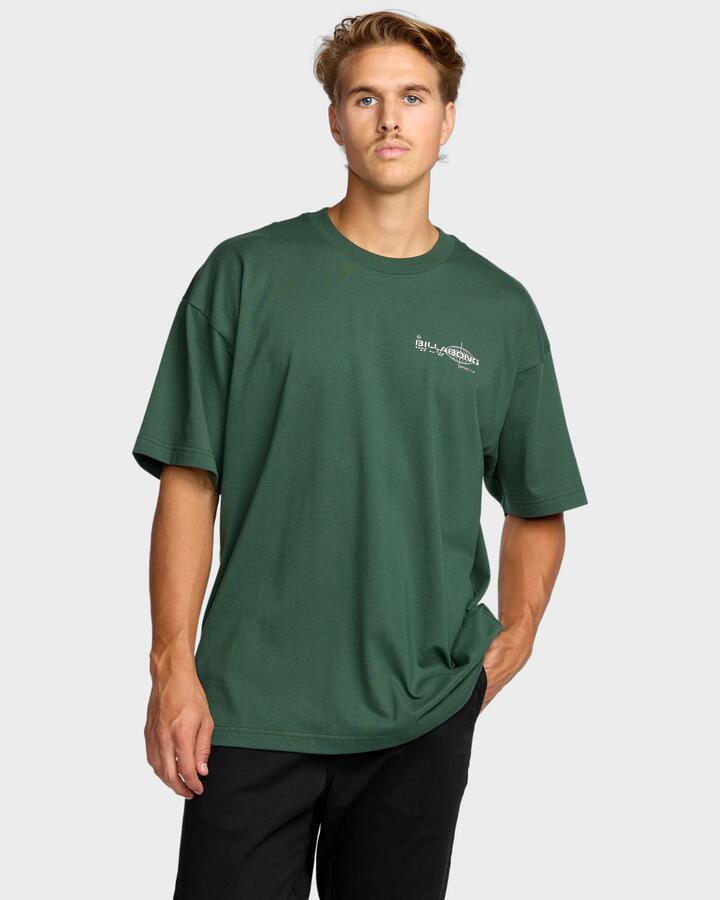 Image of a model wearing Tops. Productname: Billabong - Mens Spec 73 T-Shirt - Dark Forest - in Dark Forest colour by brand - Billabong