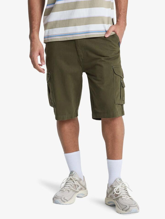 Image of a model wearing Shorts. Productname: Quiksilver - Mens Crucial Battle 21" Cargo Shorts - Grape Leaf - in Grape Leaf colour by brand - Quiksilver
