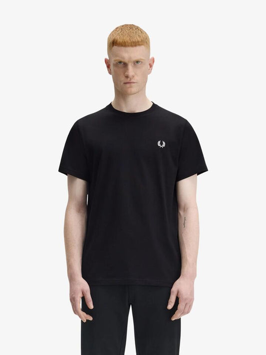 Image of a model wearing Tops. Productname: Fred Perry Tennis Graphic T-Shirt in Black colour by brand - Fred Perry