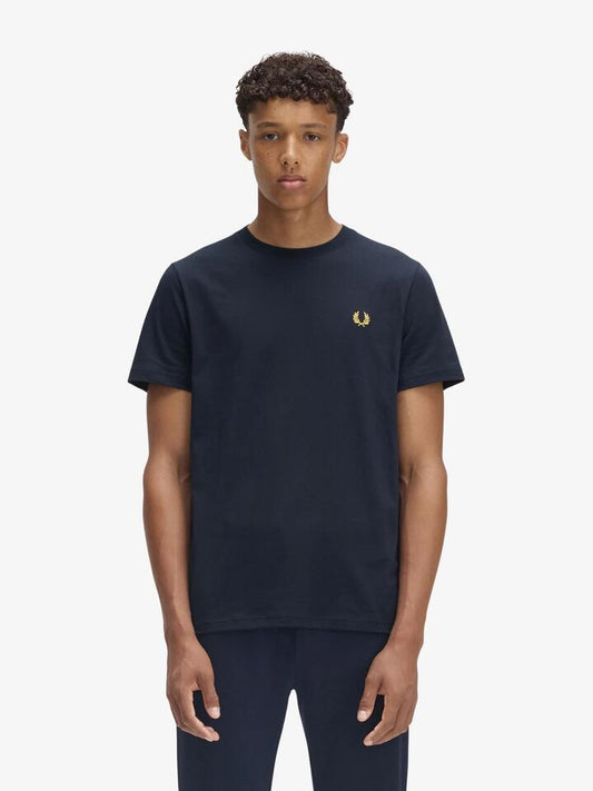 Image of a model wearing Tops. Productname: Fred Perry Tennis Graphic T-Shirt in Navy colour by brand - Fred Perry