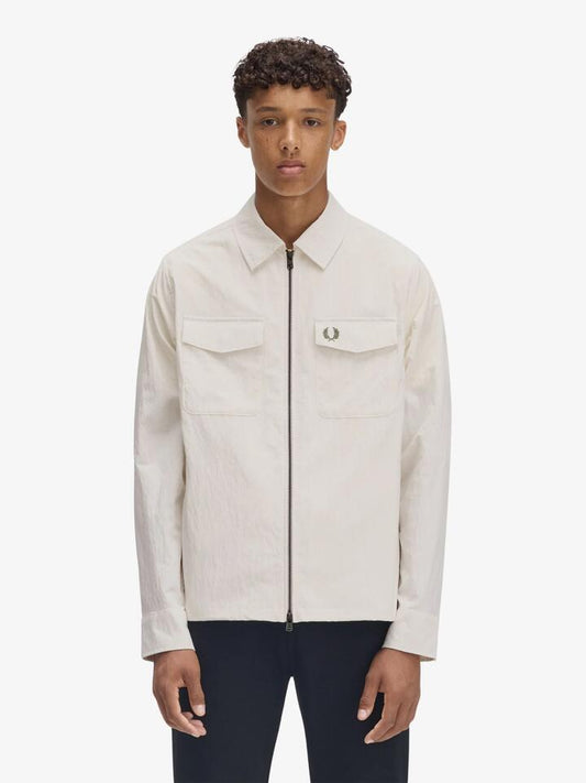 Image of a model wearing Outerwear. Productname: Fred Perry Zip Through Overshirt in Light Ecru colour by brand - Fred Perry