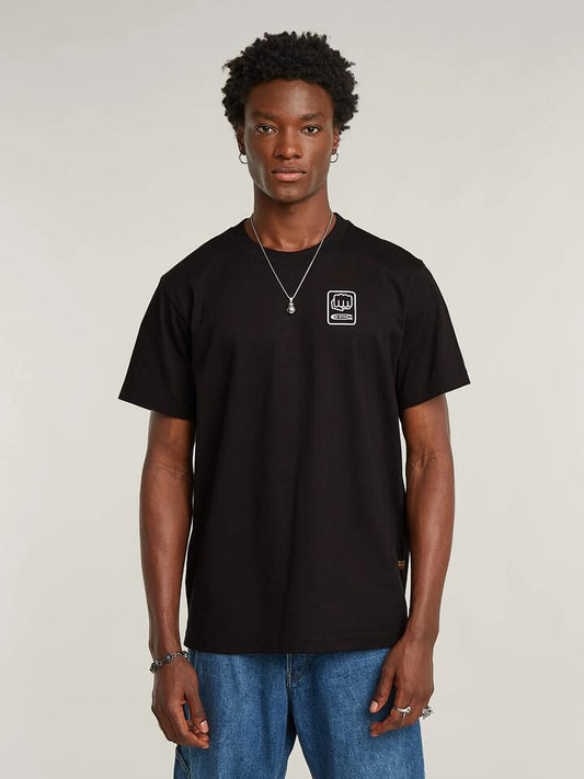 Image of a model wearing Tops. Productname: G-Star Back Graphic Loose T-Shirt in Black colour by brand - G-Star