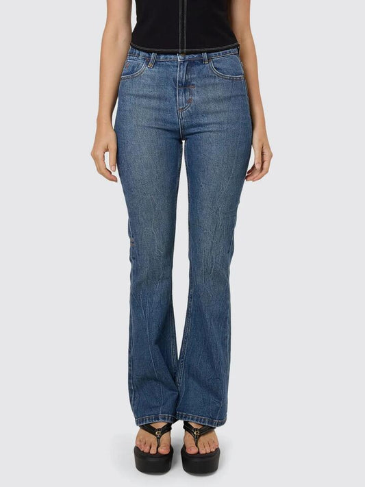 Image of a model wearing Denim. Productname: Thrills Jesse High Rise Stretch Jean in VANISH MID BLUE colour by brand - Thrills