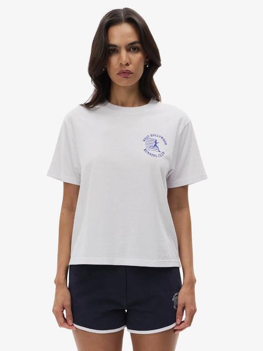 Image of a model wearing Outerwear. Productname: West Hollywood Sweat Club Running Relaxed Tee in White colour by brand - West Hollywood Sweat Club