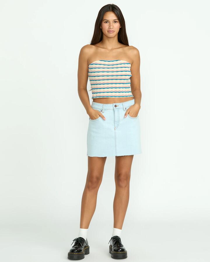 Image of a model wearing Skirts. Productname: Volcom Womens Dropping In Denim Skirt Cruzer Blue - in Cruzer Blue colour by brand - Volcom
