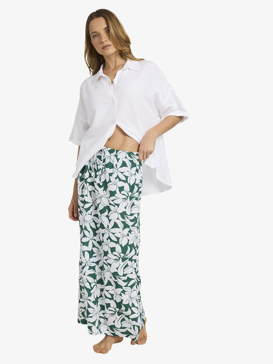 Image of a model wearing Skirts. Productname: Roxy Womens Khloe Midi Skirt Evergreen - in Evergreen colour by brand - Roxy