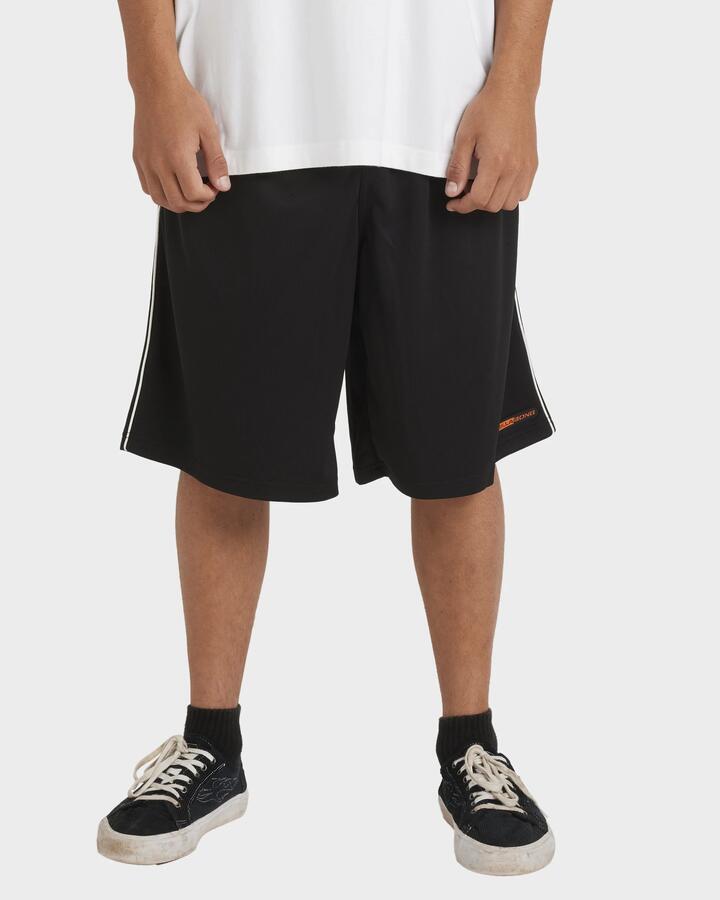 Image of a model wearing Shorts. Product name - Billabong Mens Spec 73 Mesh Walkshorts Black in Black colour by brand - Billabong