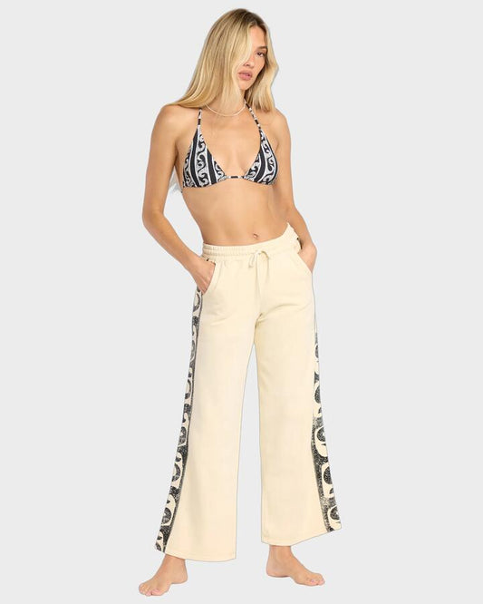 Image of a model wearing Pants. Productname: Billabong Womens Sun Wave Track Pants Whitecap - in Whitecap colour by brand - Billabong