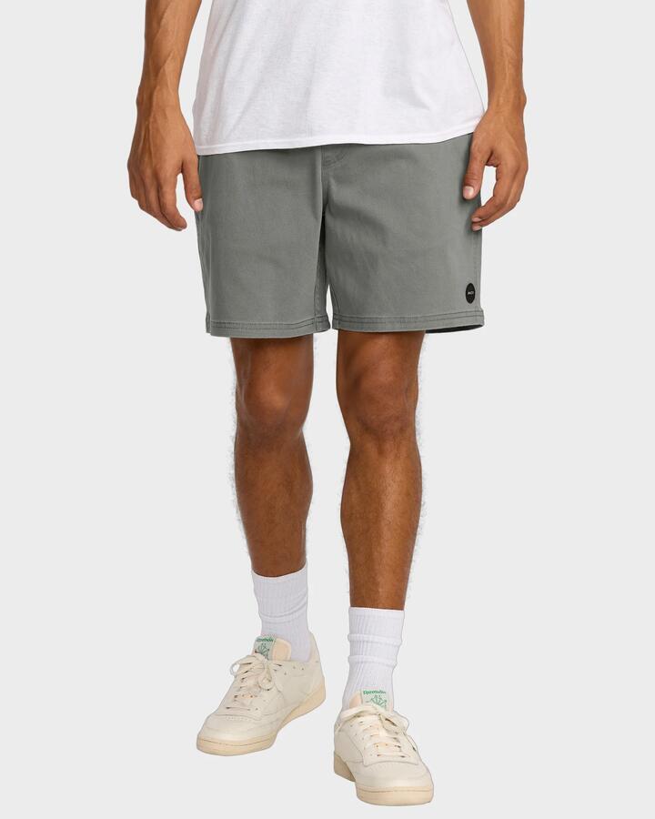 Image of a model wearing Shorts. Product name - RVCA Mens Escape Elastic Walkshorts Sage Leaf in Sage Leaf colour by brand - RVCA