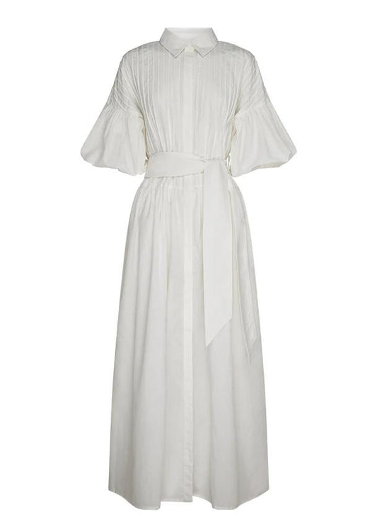 Image of a model wearing Dress. Productname: Aurelia Maxi Dress in Pearl colour by brand - MOS The Label