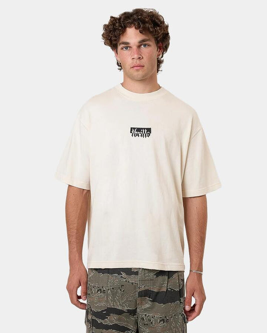 Image of a model wearing Tops. Productname: Thrills Mens Cheap Thrills Embro Oversized T-Shirt Natural - in Natural colour by brand - Thrills