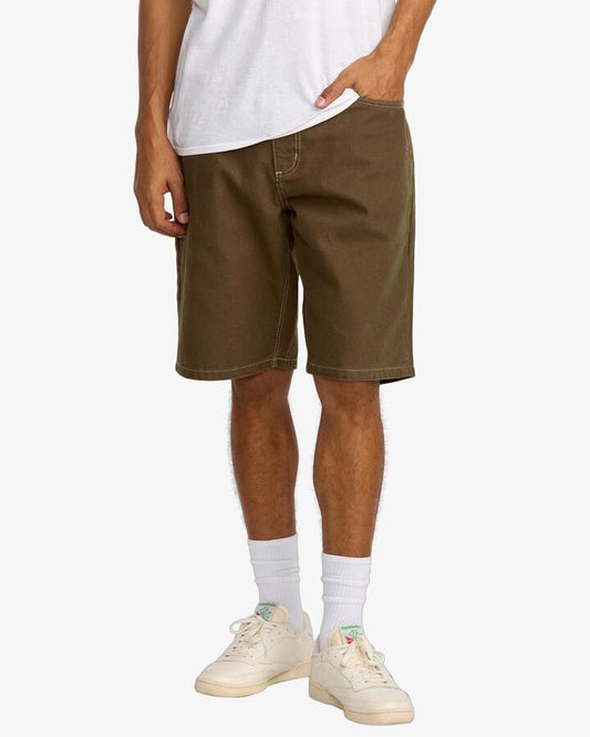 Image of a model wearing Shorts. Product name - RVCA Mens Dayshift 21" Walkshorts Bombay Brown in Bombay Brown colour by brand - RVCA