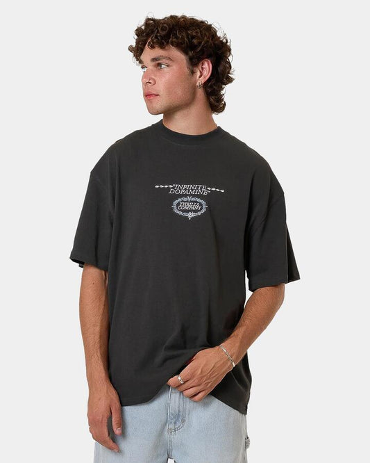 Image of a model wearing Tops. Productname: Thrills Mens Infinite Dopamine T-Shirt Black - in Black colour by brand - Thrills