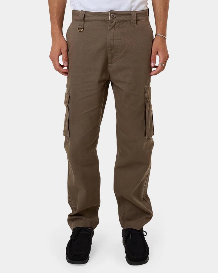 Image of a model wearing Pants. Product name - Thrills Mens Slacker Union Cargo Pants Brown in Brown colour by brand - Thrills