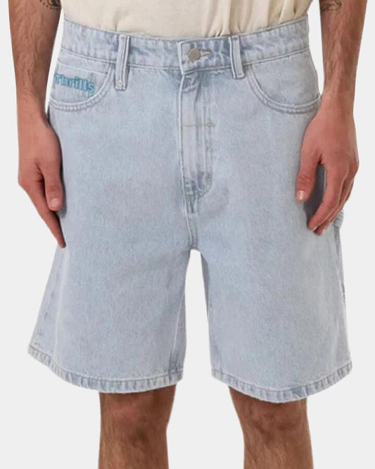 Image of a model wearing Shorts. Product name - Thrills Mens Hazed Slacker Denim Shorts Light Ash Blue in Light Ash Blue colour by brand - Thrills