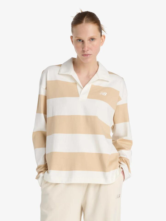 Image of a model wearing Tops. Productname: New Balance Rugby Long Sleeve in Desert Clay colour by brand - New Balance