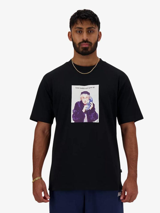 Image of a model wearing Tops. Productname: New Balance Athletics Never Age T-Shirt in Black colour by brand - New Balance