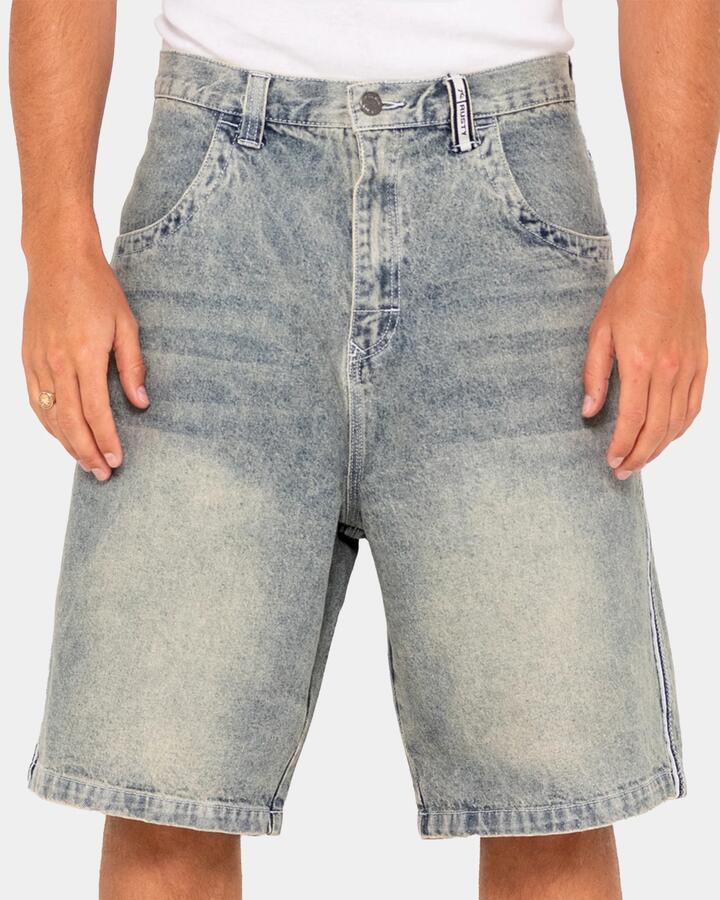 Image of a model wearing Shorts. Productname: Rusty - Mens Flip Daddy Draggin Denim Shorts - Dirty Dawg - in Dirty Dawg colour by brand - Rusty
