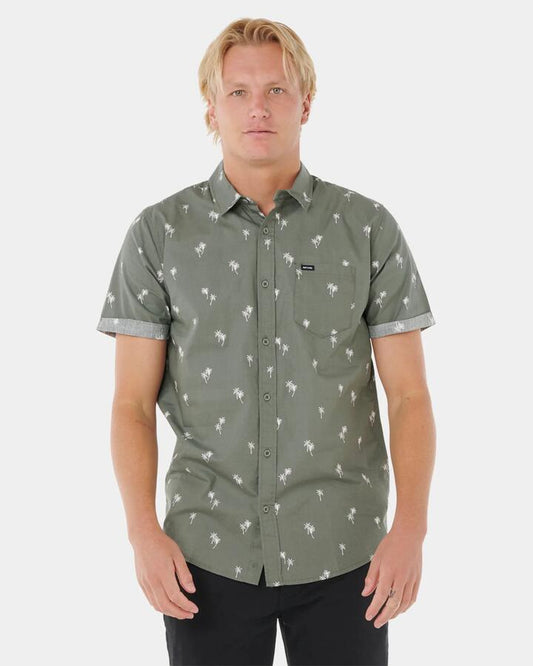 Image of a model wearing Tops. Productname: Rip Curl - Mens Paradise Palms Short Sleeve Shirt - Cactus Green - in Cactus Green colour by brand - Rip Curl
