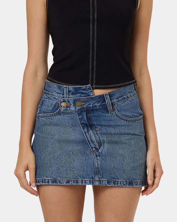 Image of a model wearing Skirts. Productname: Thrills - Womens Kai Wrap Denim Skirt - Blue - in Blue colour by brand - Thrills