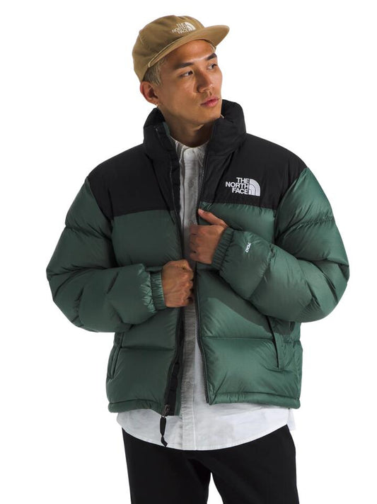 Image of a model wearing Denim. Productname: The North Face 1996 Retro Nuptse in Duck Green/Tnf Black colour by brand - The North Face