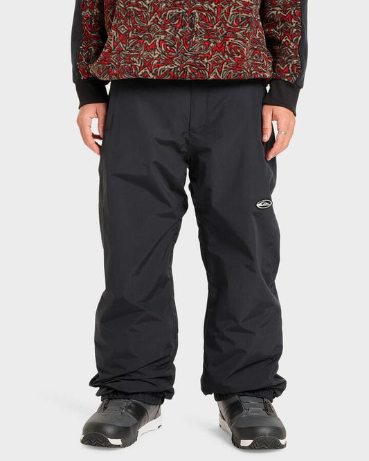 Image of a model wearing Pants. Productname: Quiksilver - Mens Snow Down Snow Pants - True Black - in True Black colour by brand - Quiksilver