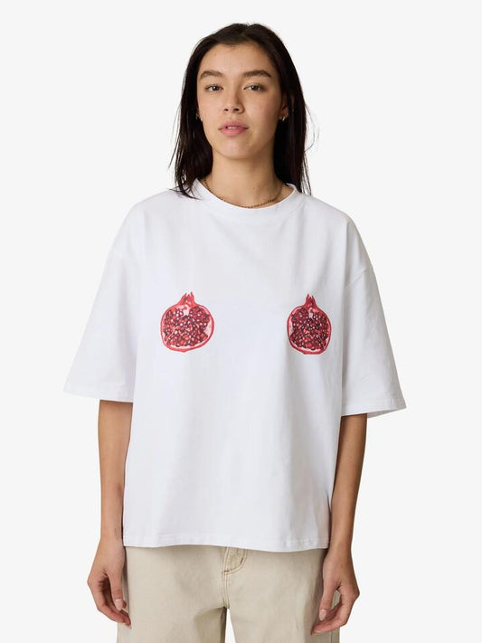 Image of a model wearing Tops. Productname: SNDYS Mai Tai T-Shirt in Pomegranate colour by brand - SNDYS