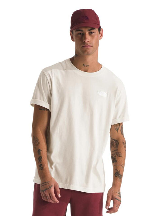 Image of a model wearing Denim. Productname: The North Face S/S Evolution Box Fit T in White Dune colour by brand - The North Face
