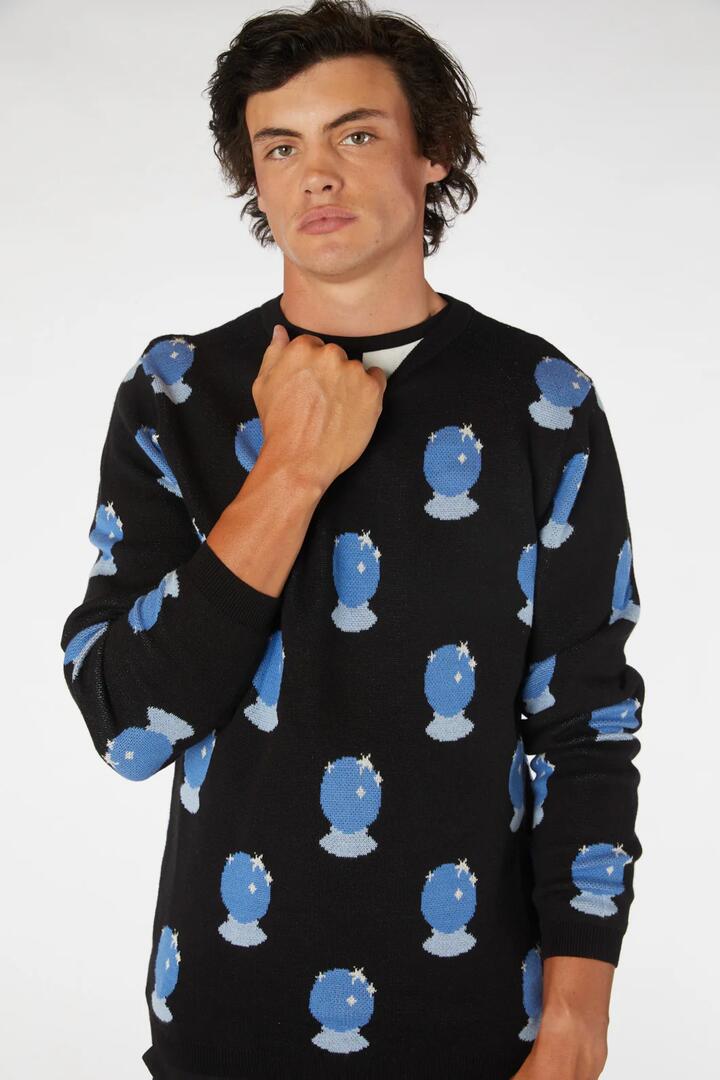 Image of a model wearing Tops. Productname: Crystal Ball Knit in Black colour by brand - Black Friday