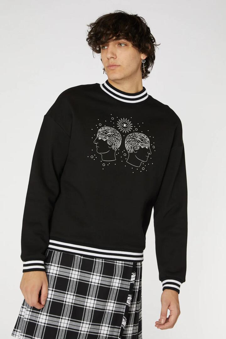 Image of a model wearing Outerwear. Productname: Read Into It Sweater in Black colour by brand - Black Friday