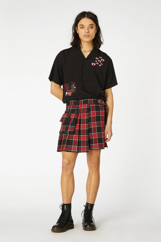 Image of a model wearing Skirts. Productname: Goth Tartan Clip Skort in Red colour by brand - Black Friday