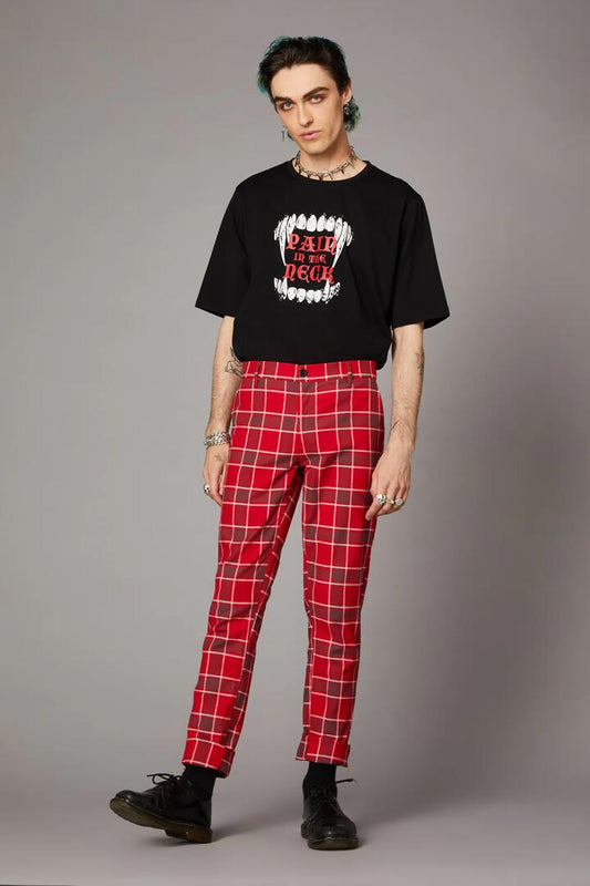 Image of a model wearing Pants. Productname: Punk Red Tartan Unisex Pant in Red colour by brand - Black Friday