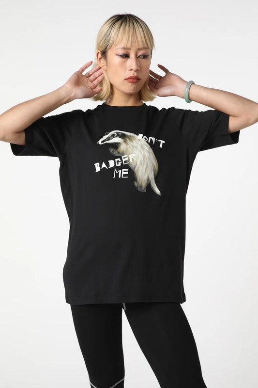 Image of a model wearing Tops. Productname: Badger Tee in Black colour by brand - Black Friday
