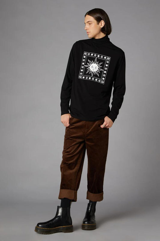 Image of a model wearing Tops. Productname: 90S Sun Print LS Top in Black colour by brand - Black Friday