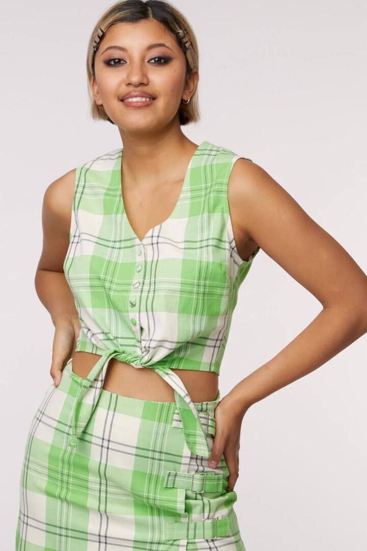 Image of a model wearing Tops. Productname: Acidic Top in Green colour by brand - Black Friday