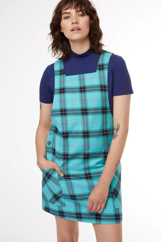 Image of a model wearing Dress. Productname: Charmer Pinafore in Teal colour by brand - Black Friday