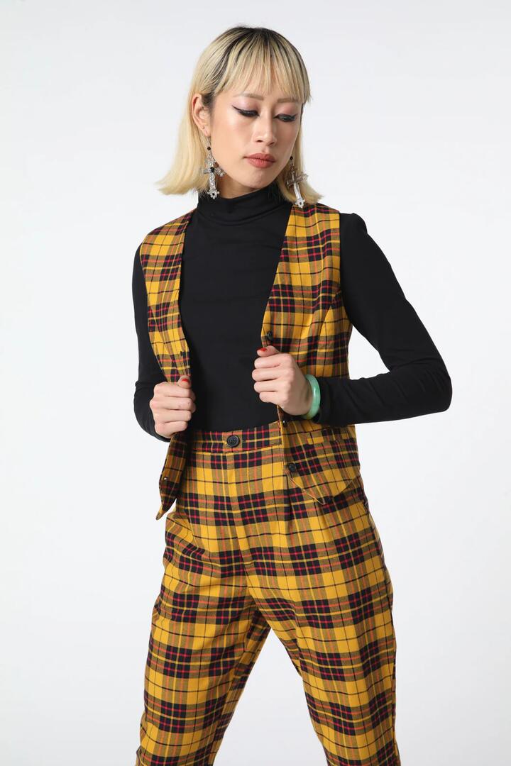 Image of a model wearing Tops. Productname: Arcana Tartan Crop Vest in Mustard colour by brand - Dangerfield