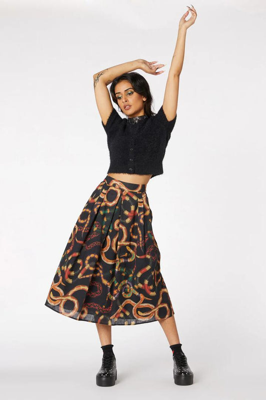 Image of a model wearing Skirts. Productname: Serpent Print Pleated Skirt in Black colour by brand - Dangerfield