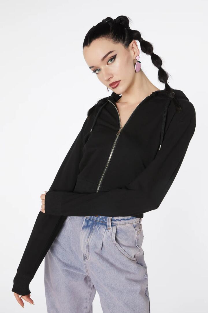 Image of a model wearing Outerwear. Productname: Puppy Boxy Cotton Hoodie in Black colour by brand - Dangerfield
