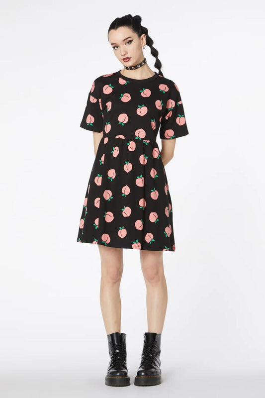 Image of a model wearing Dress. Productname: You Peach Cotton Smock Dress in Black colour by brand - Dangerfield