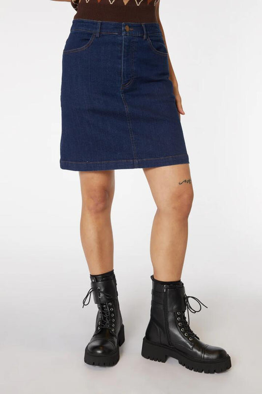 Image of a model wearing Denim. Productname: Denim Cherub Mini Skirt in Indigo colour by brand - Dangerfield
