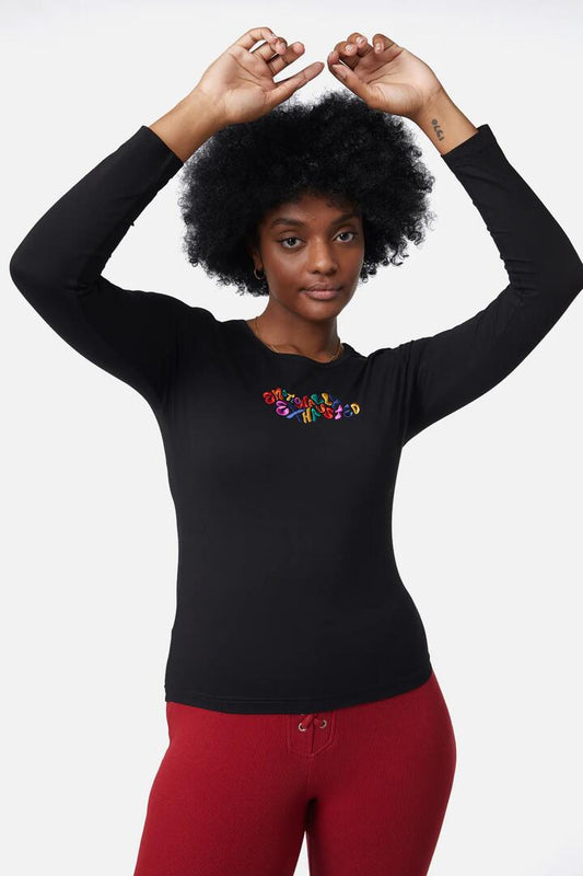 Image of a model wearing Tops. Product name - Emrboidered Emotions Top in Black colour by brand - Dangerfield