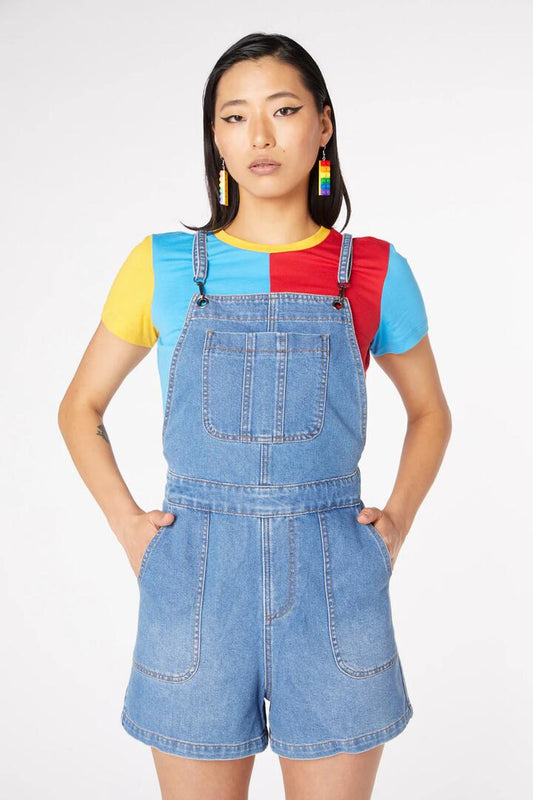Image of a model wearing Denim. Productname: Aggro Bib Denim Playsuit in Indigo colour by brand - Dangerfield
