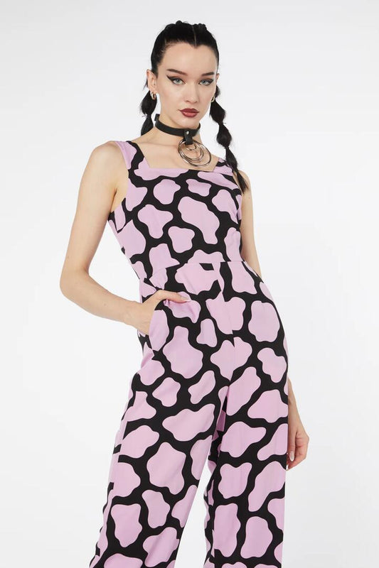 Image of a model wearing Outerwear. Productname: Skip Geo Wide Leg Jumpsuit in Black/Pink colour by brand - Dangerfield