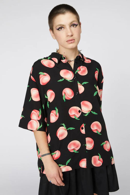 Image of a model wearing Tops. Productname: Peachy Viscose Boxy Shirt in Black colour by brand - Dangerfield