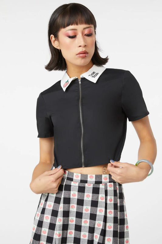 Image of a model wearing Tops. Productname: Embroidery Peach Blouse in Black colour by brand - Dangerfield